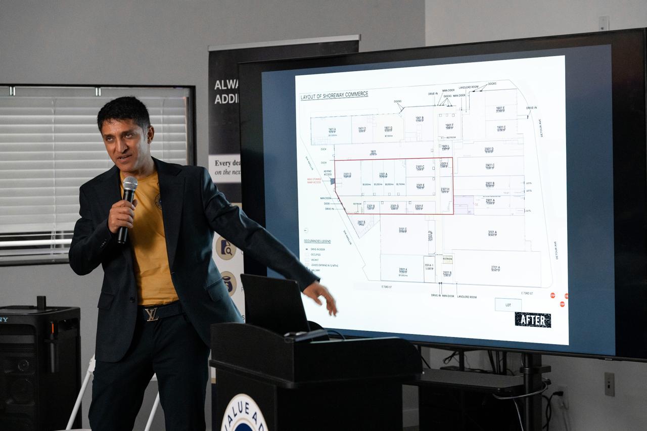 Presenter walking through a commercial property layout with participants